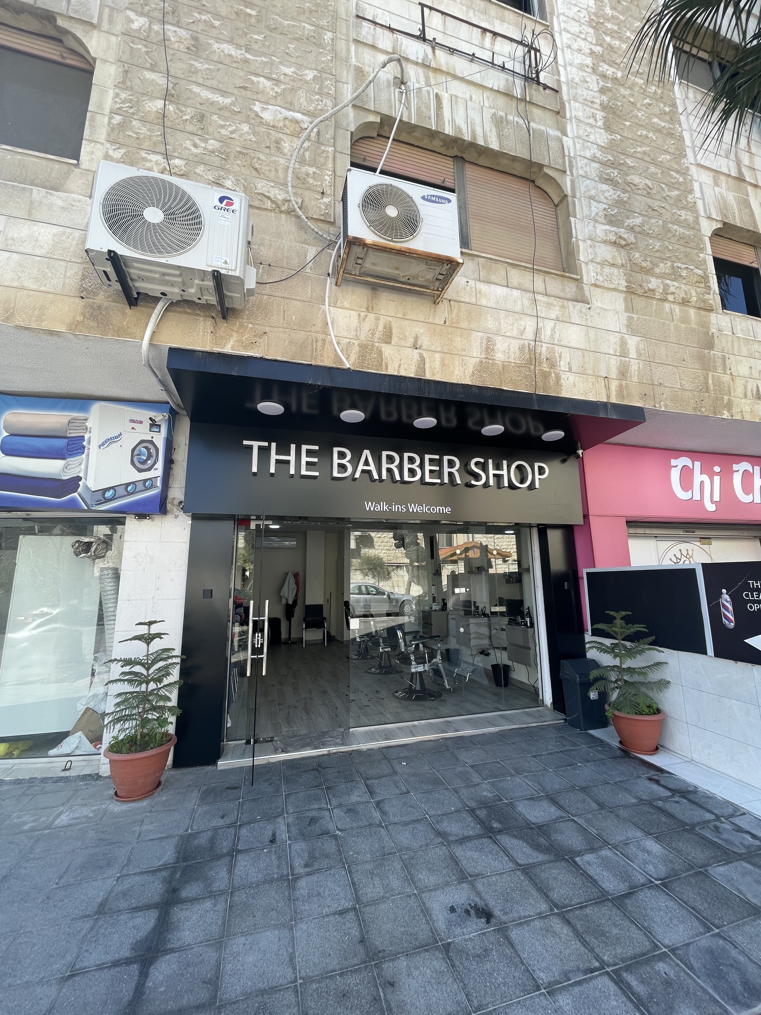 The Barber Shop daytime storefront entrance